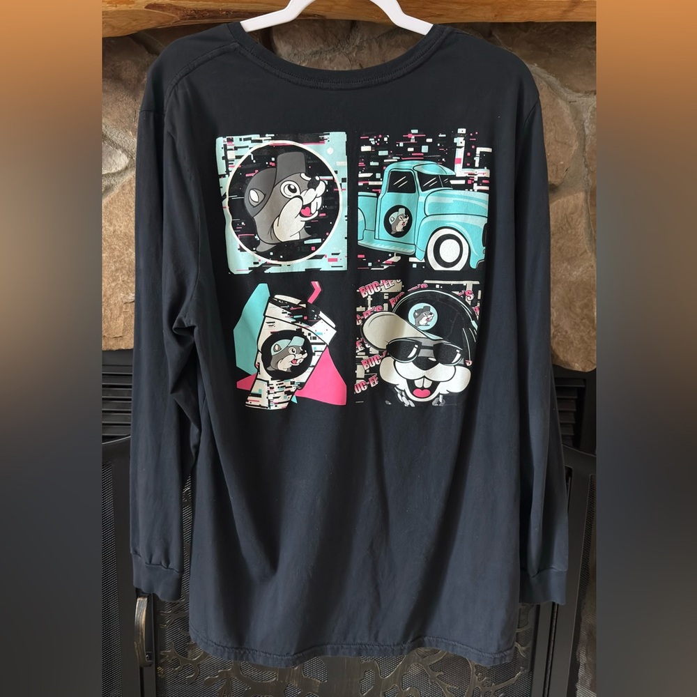 Women’s Buc-ee’s  Long Sleeve Black Graphic Tee with Aqua & Pink Cartoon Print